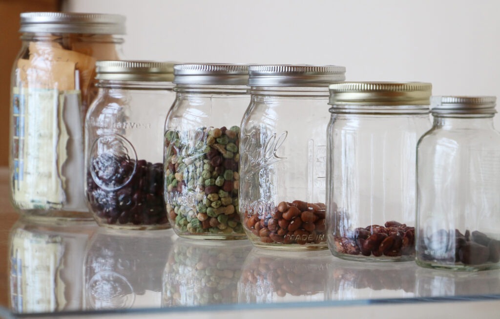 Seeds in glass mason jars.